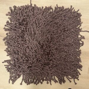 TWO TAUPE COLORED PILLOW COVERS (2)